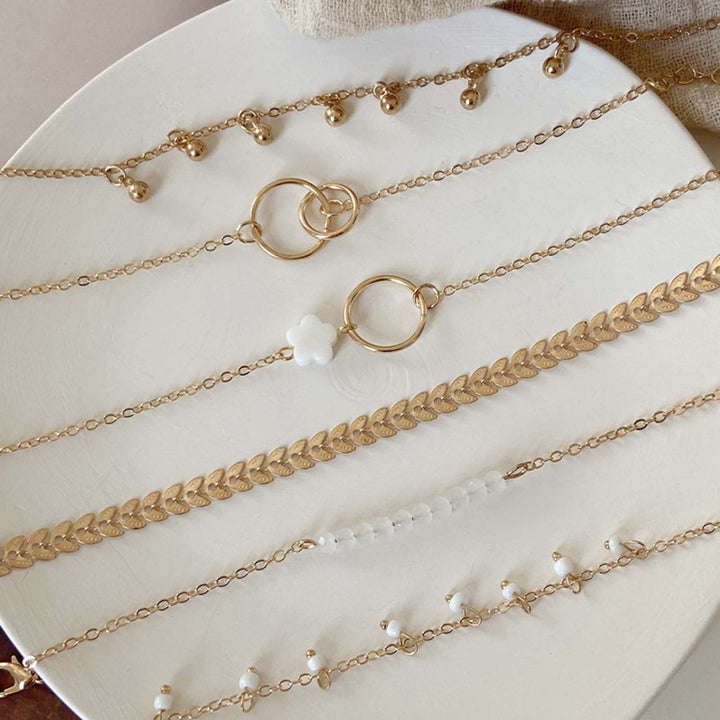 Paquete de pulseras de oro vintage