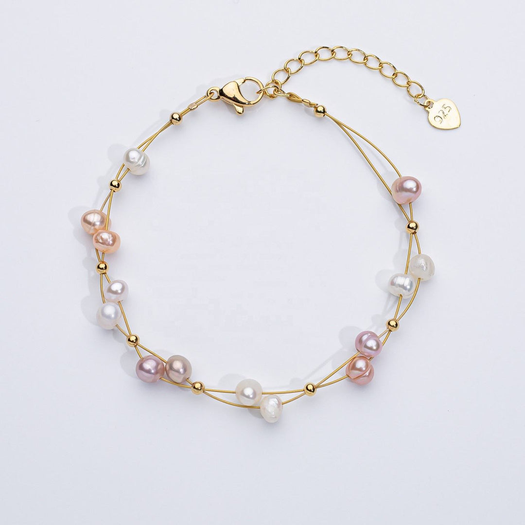 Pulsera tejida con perlas de agua dulce