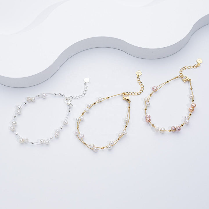 Pulsera tejida con perlas de agua dulce