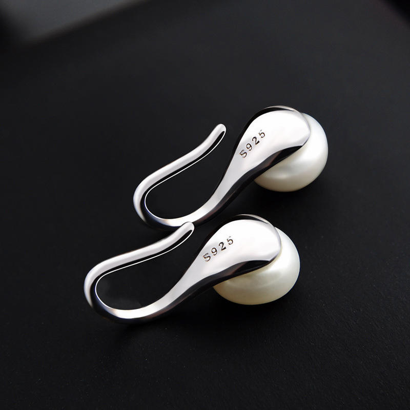 Pendientes colgantes de concha y perla