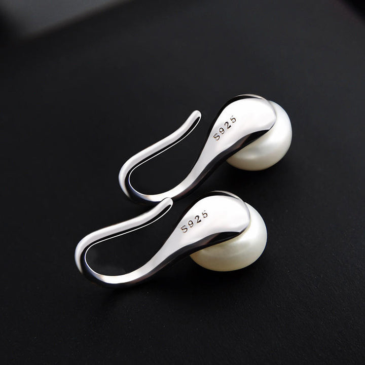 Pendientes colgantes de concha y perla