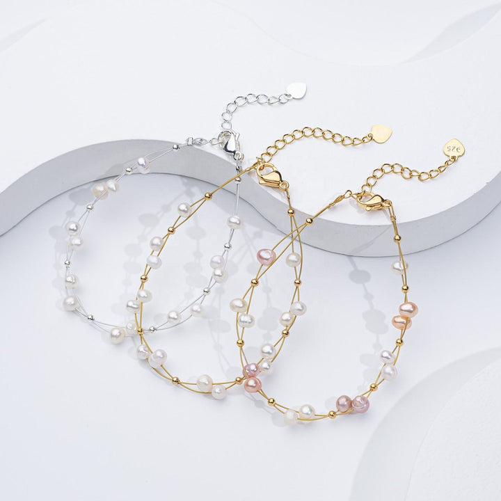 Pulsera tejida con perlas de agua dulce