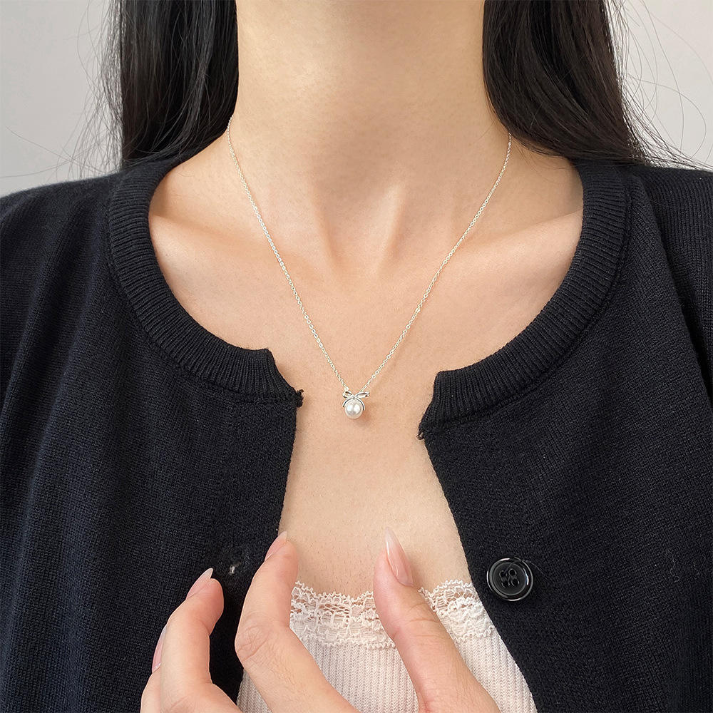 Collar de perlas de mariposa