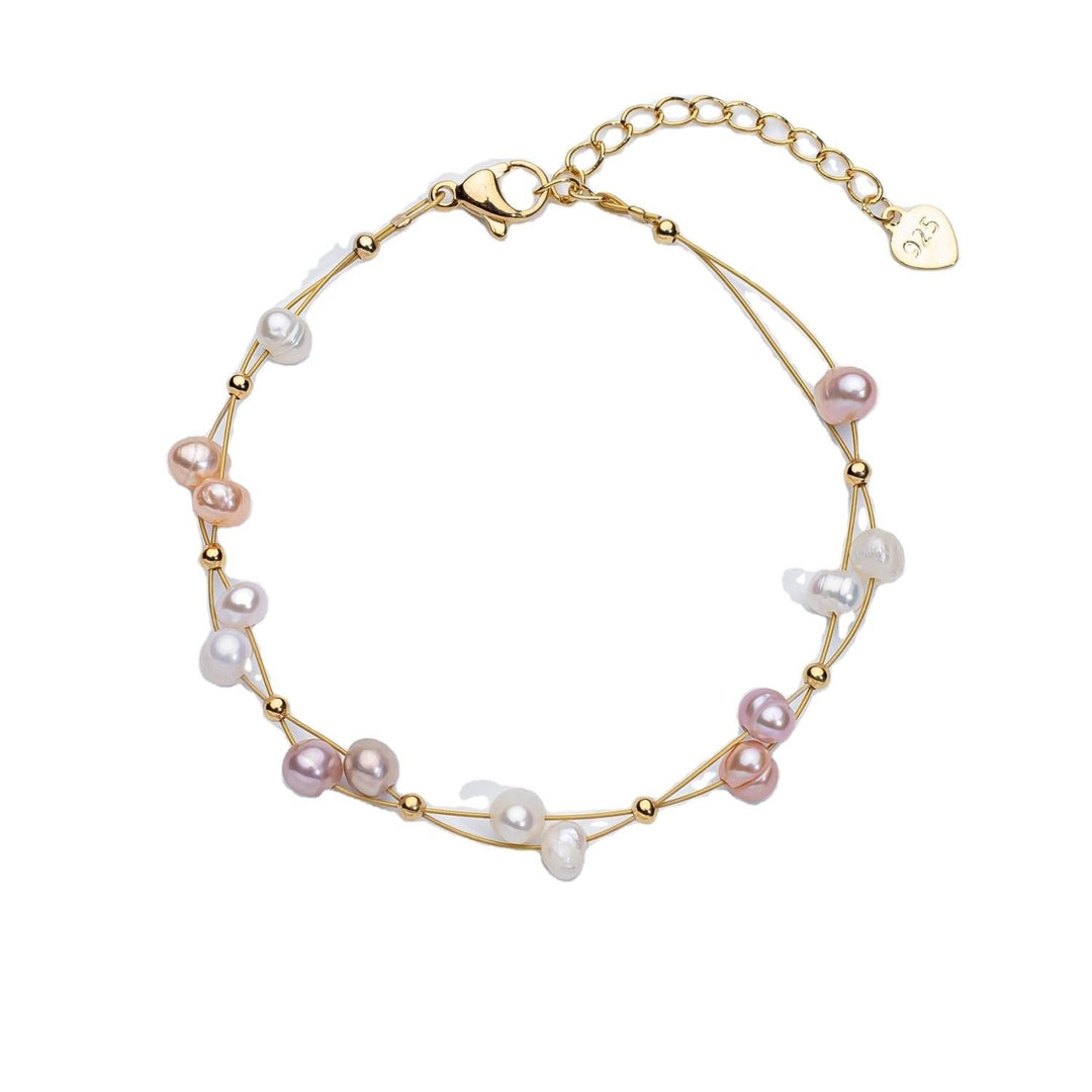 Pulsera tejida con perlas de agua dulce