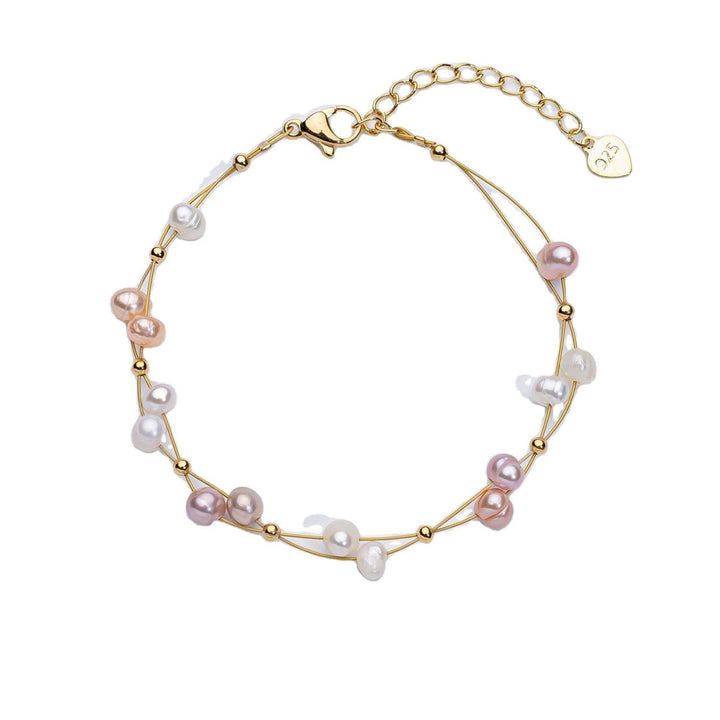 Pulsera tejida con perlas de agua dulce