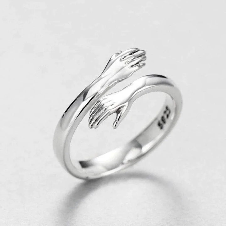Anillo de abrazo de plata ajustable